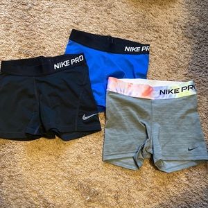 3 pairs of nike pros